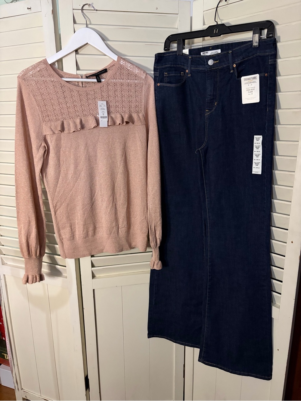 Two piece PREMIUM outfit including NWT Levi’s flare jeans and a NWT WHBM sweater